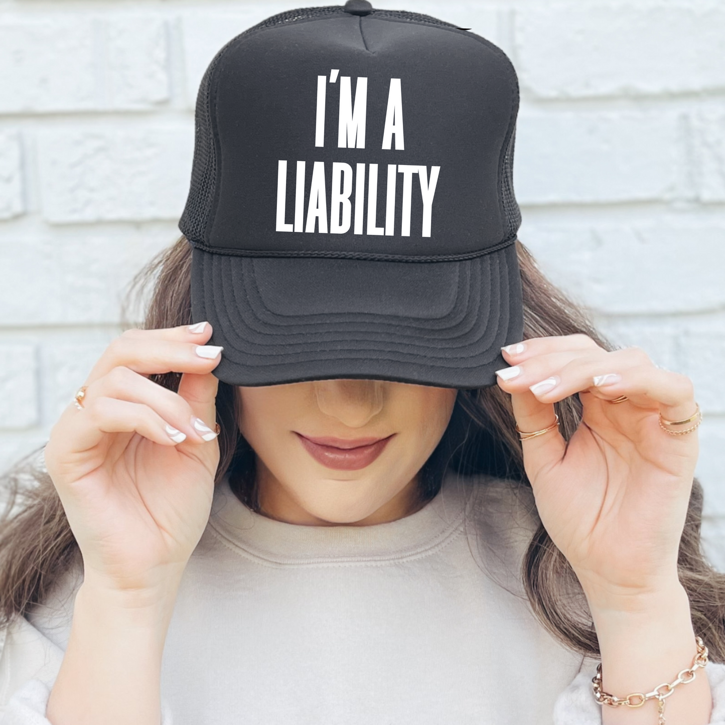 I’m A Liability Trucker Hat